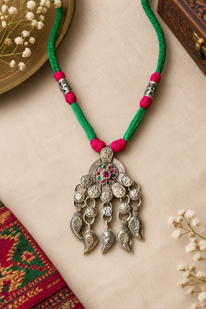 Nusrat Afghani pendant thread necklace
