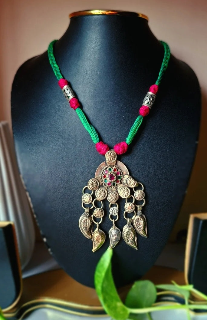 Nusrat Afghani pendant thread necklace