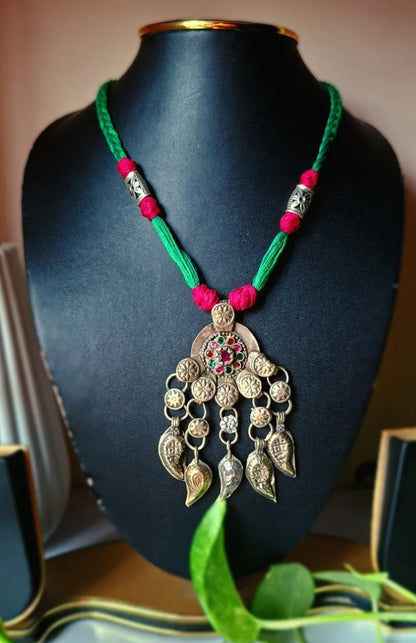 Nusrat Afghani pendant thread necklace