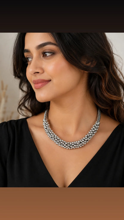 Mrinalini brass ghungroo necklace