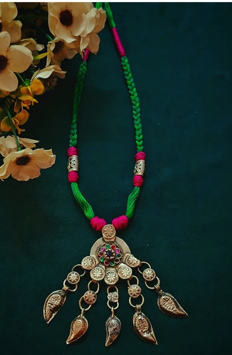 Nusrat Afghani pendant thread necklace