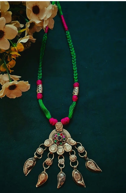 Nusrat Afghani pendant thread necklace